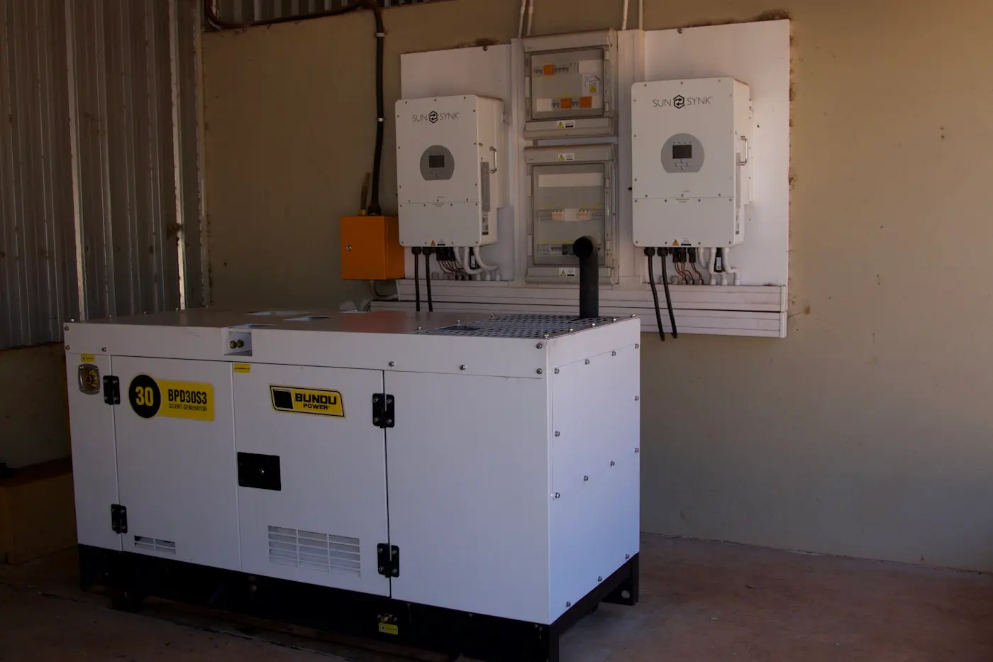 Industrial diesel generating set installed beside power distribution equipment